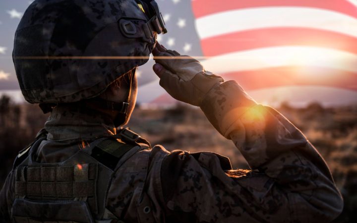 Solider with Flag in Background
